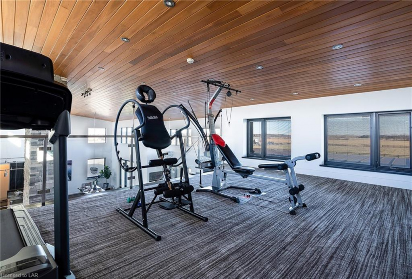 Ascent to the second floor loft that is the perfect work out area or additional family room space.  Large picture windows to continue with the brightness in every room of the house.