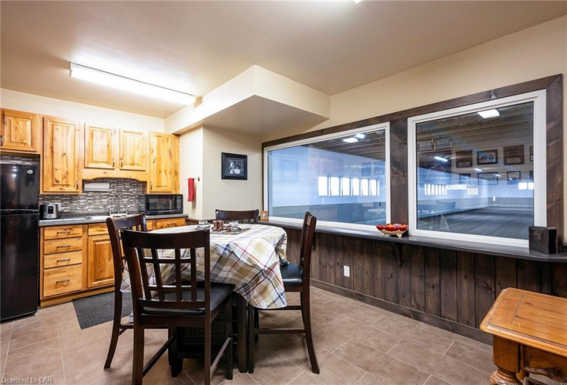 Kitchen facility in barn with complete viewing gallary of the riding arena.