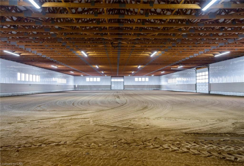 Fantastic indoor riding arena. Bright lighting and insulated walls.  Great ground for all disciplines.