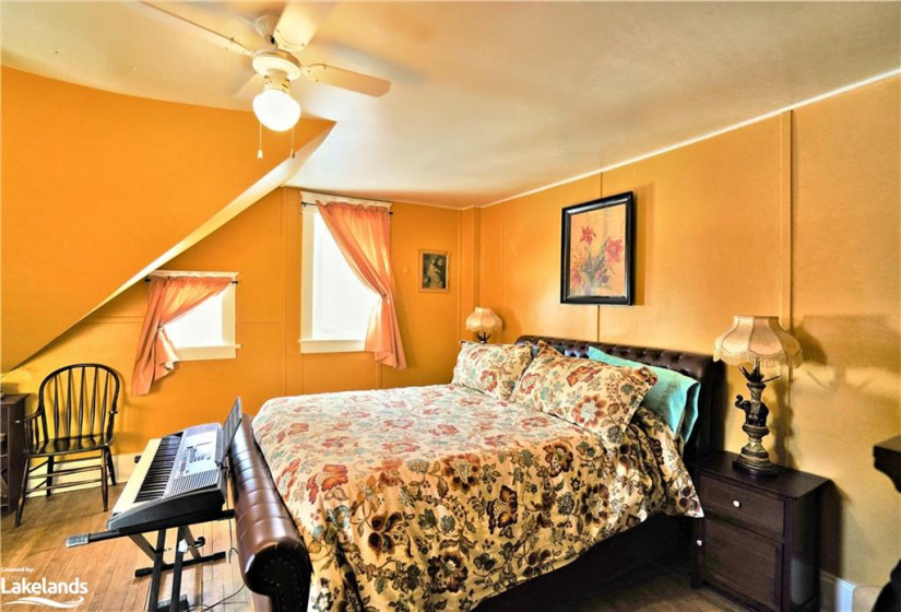 Love the brightness of this bedroom! To the left is more space and the closet.